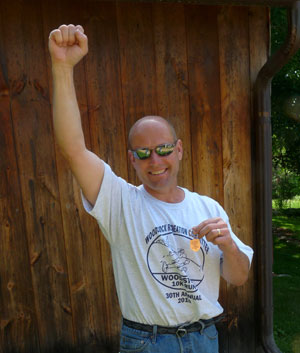 Doug celebrates after a race